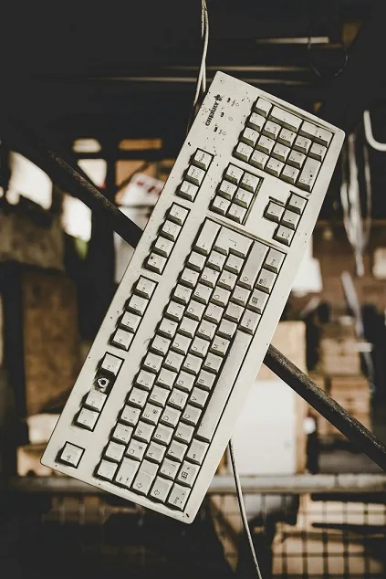 Illustration of an old computer keyboard. Symbolizes the loss of access to resources.